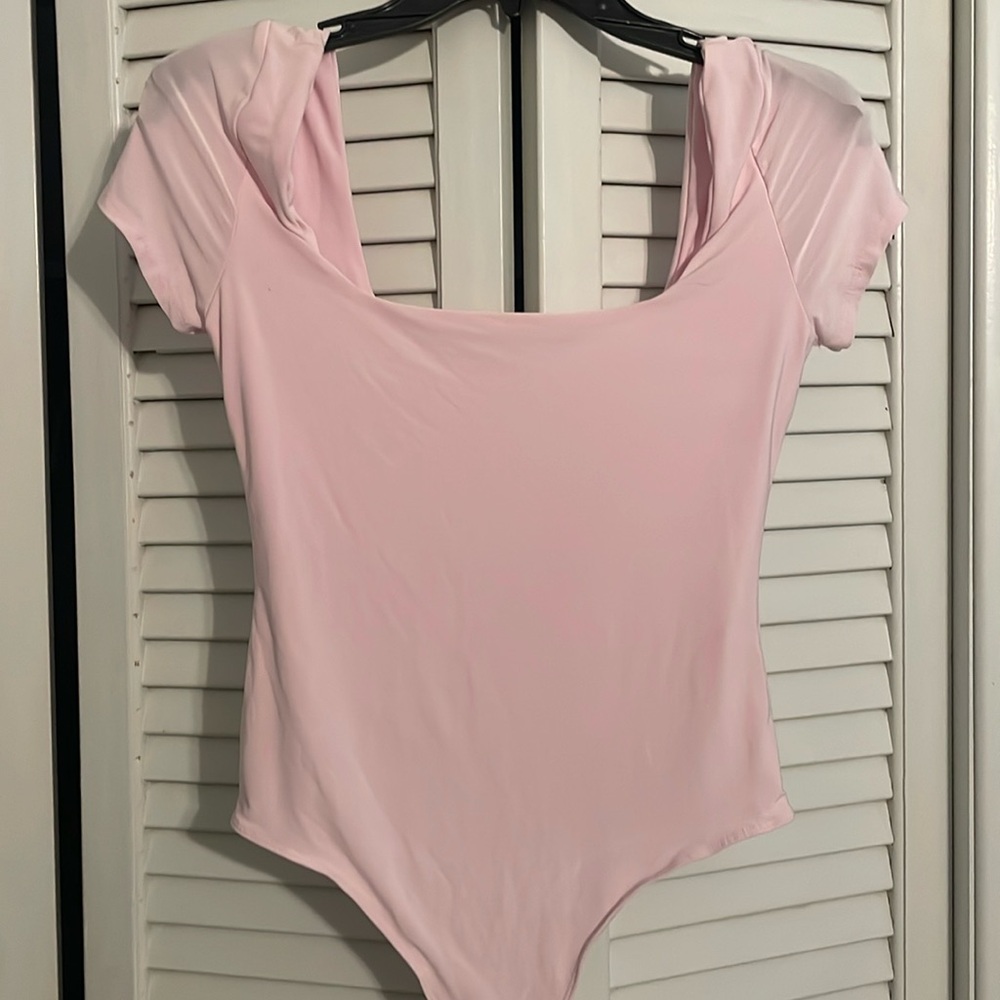 Pink bodysuit